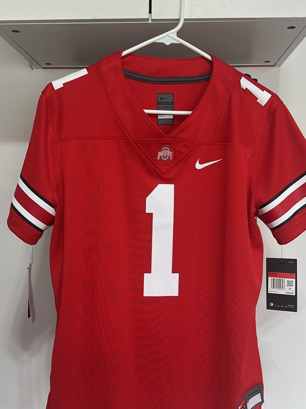 Nike women’s red Football Jersey- LG